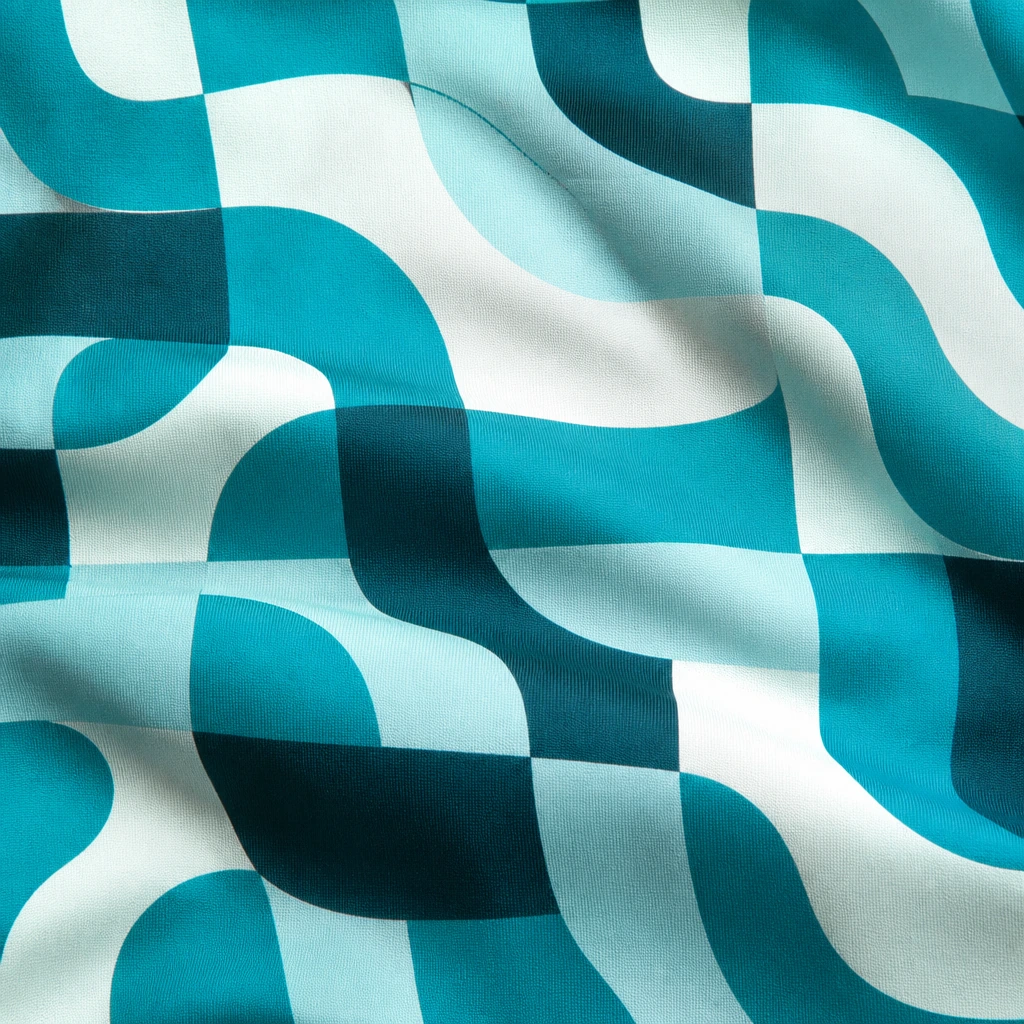 Swim jersey printed with the Shorebreak repeat, folded so the arcs bend across the cloth