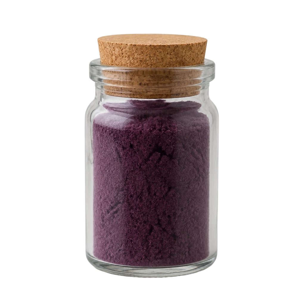 A glass jar of dry purple dye pigment with a cork stopper